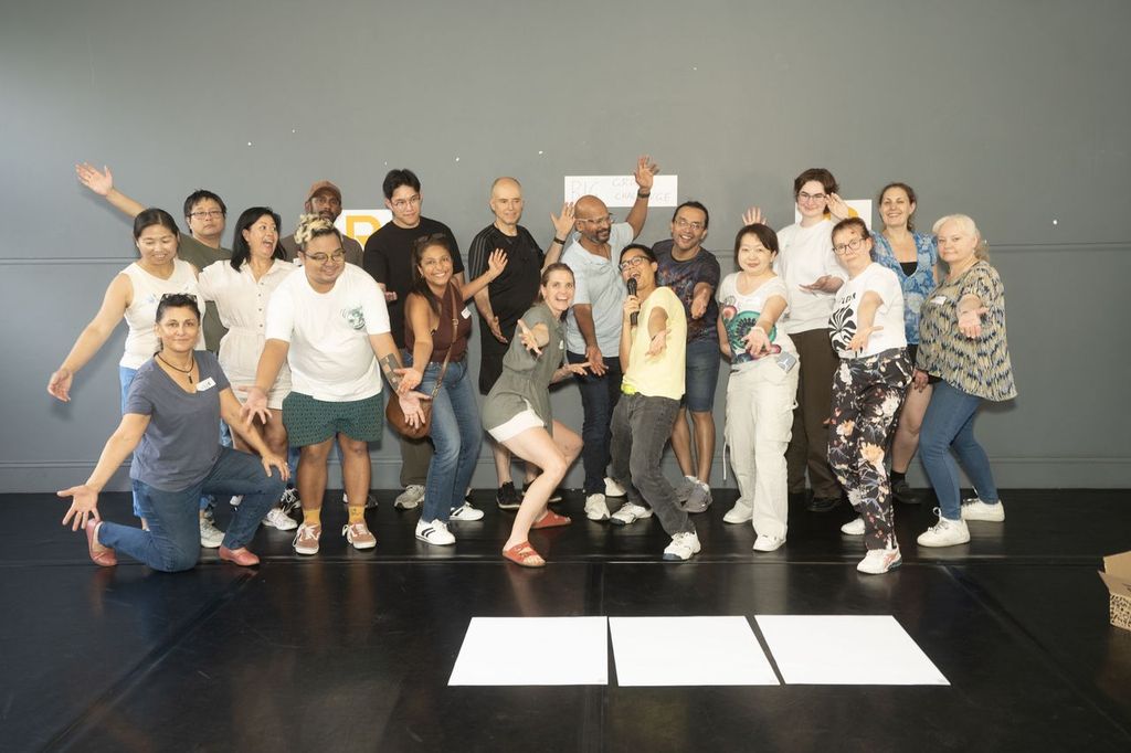 Utopia Rising Corporate team building improv workshop group photo