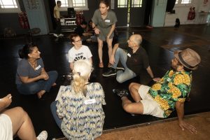 Corporate Team Building for Utopia Rising showing participants engaged in the Improv Workshop by Pamela Pilawa in Sydney