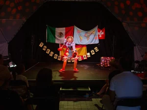 Photo of Sydney based actress Pamela Pilawa performing a family friendly theatre multilingual show in Sydney Fringe Festival